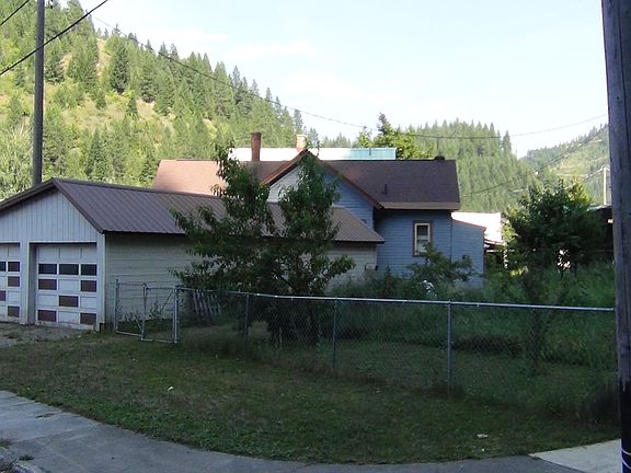 2 Car Garage with shop.
