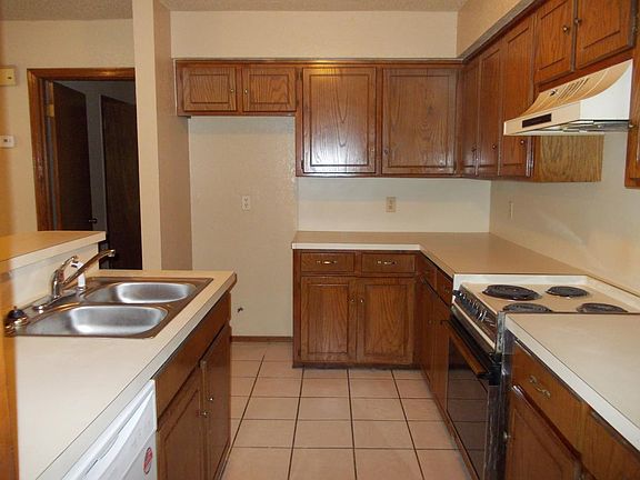 kitchen picture is taken from the laundry area by the walk through garage door