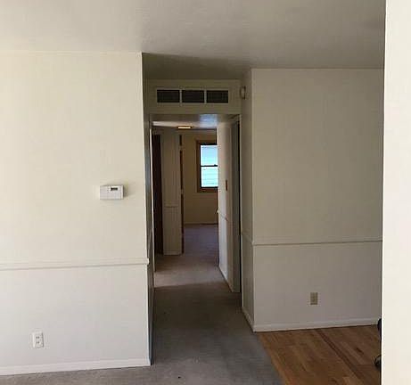 Hallway to three BR and Bath