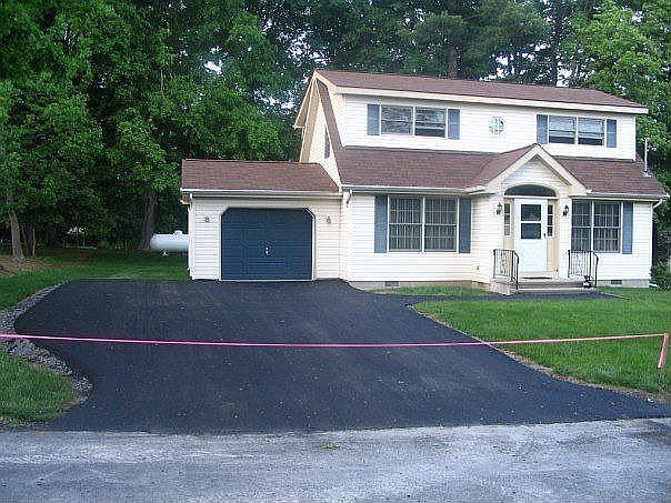 Featuring new paved driveway