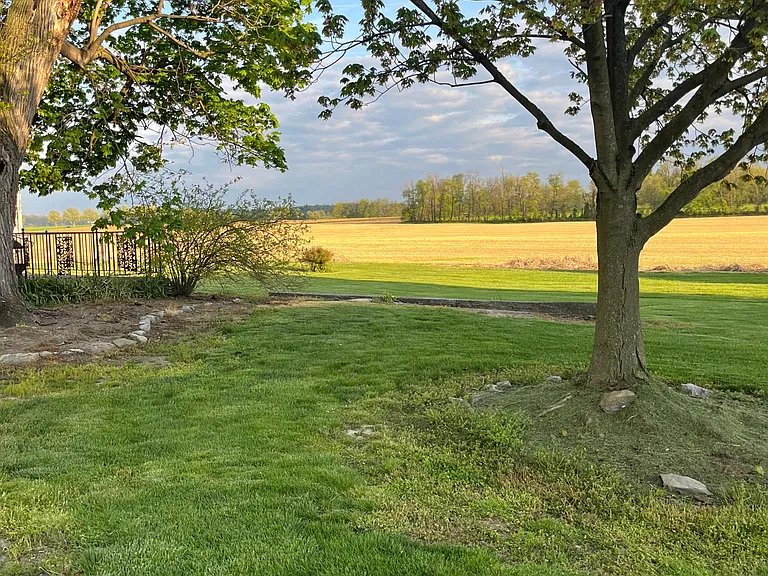 View out the front door of house to the left of the property