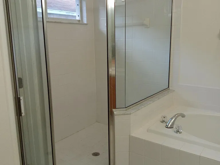 Master bath walk in shower and garden tub.