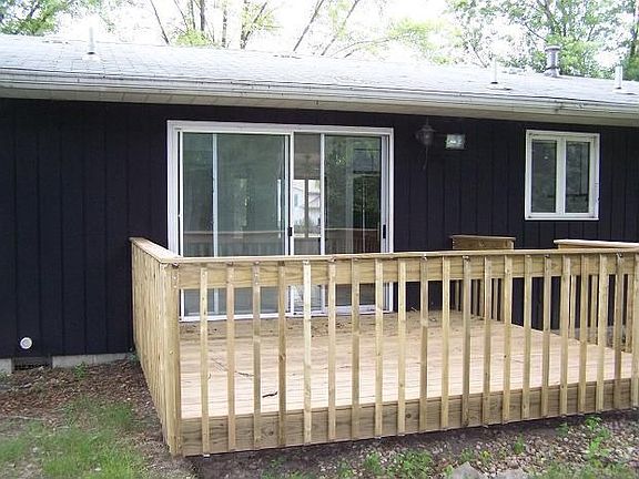 Deck overlooking wooded area