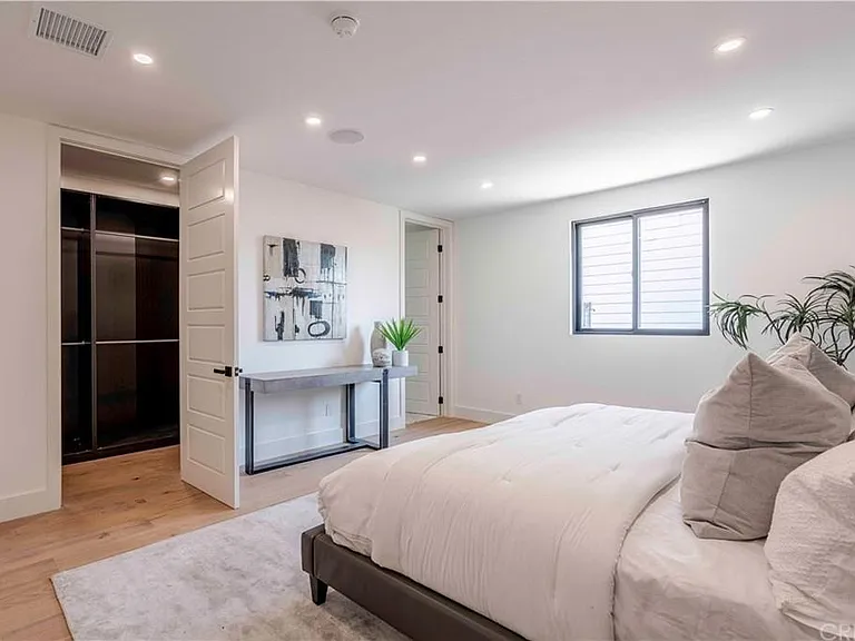 Walk-in closet within the master bedroom.