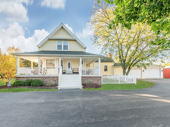 The inviting front porch welcomes you to step right in, where you will continuously be amazed by thi