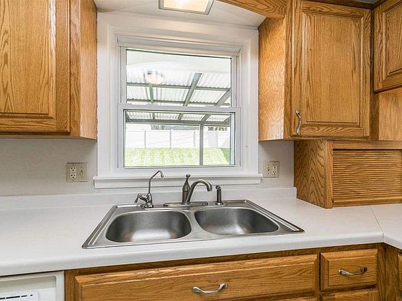 Kitchen looking into backyard
