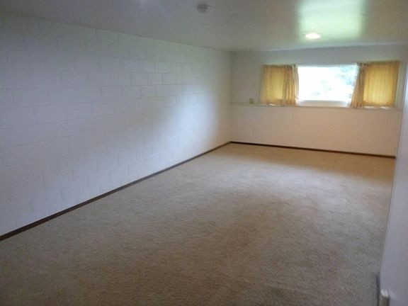Downstairs living area, or master bed