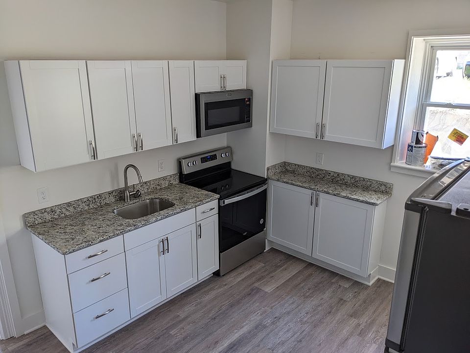 Updated kitchen with granite counters and vinyl floors!