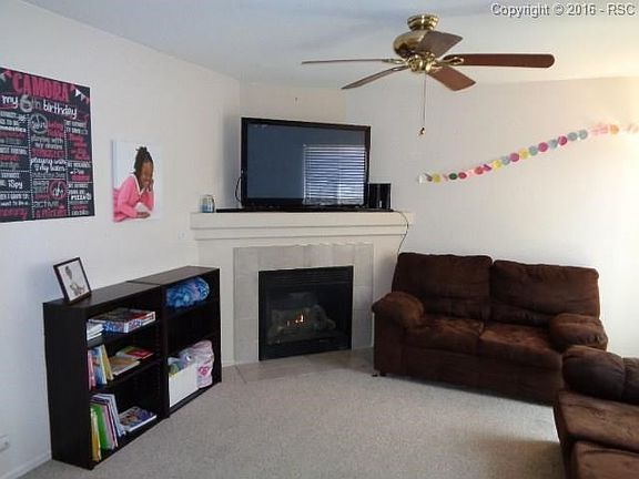 Cozy living room with gas fireplace.
