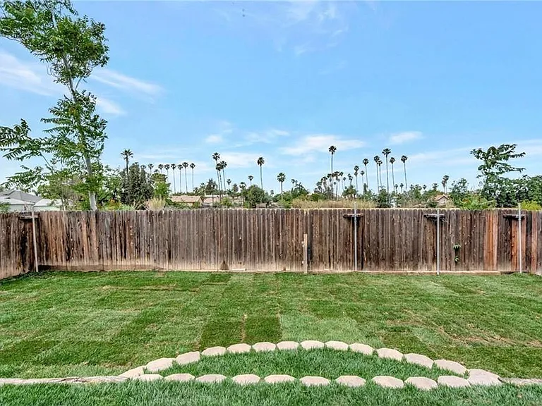 Step into our serene backyard oasis, offering ample space to relax and unwind while enjoying the California sunshine!