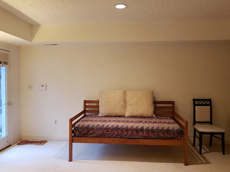 Spare bed for guests/visitors.