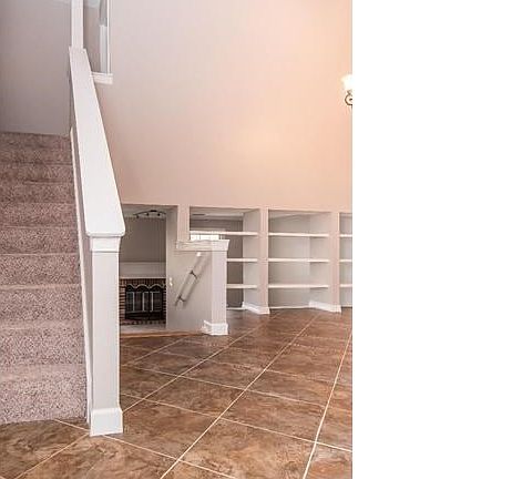 Dramatic Entry with Vaulted Ceiling and new ceramic flooring/