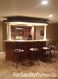 Downstairs wet bar
						:
						Built in shelves and cabinets