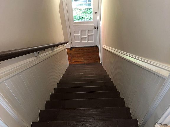 Stairwell with side door entry.