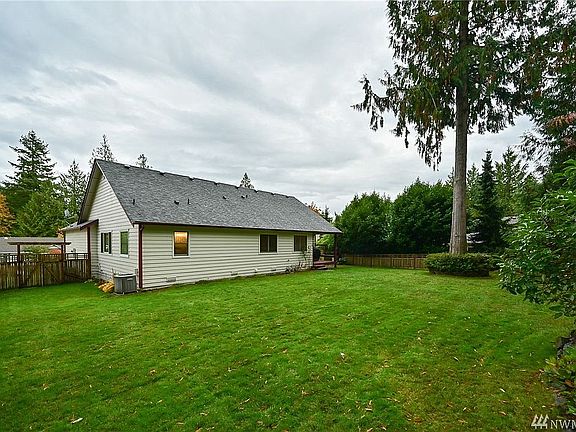 Fully fenced-in beautiful and private backyard with a shed.
