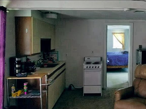 Kitchenette - Some furniture available.