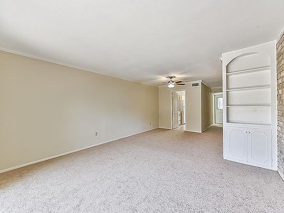 Large Living Area Also Features Dining Area, & Built-Ins.