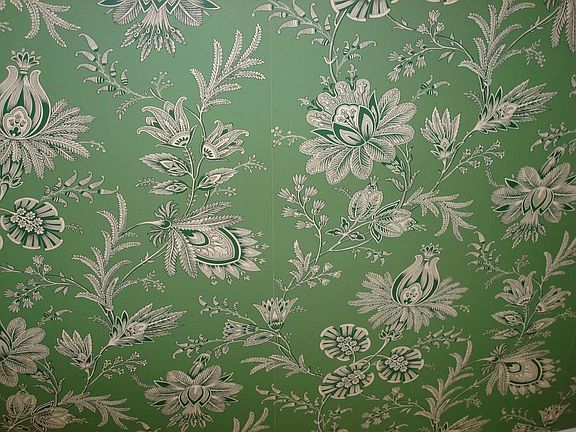 This is designer wallpaper on one wall in Kitchen