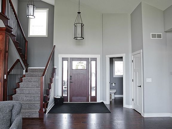 staircase to foyer and loft