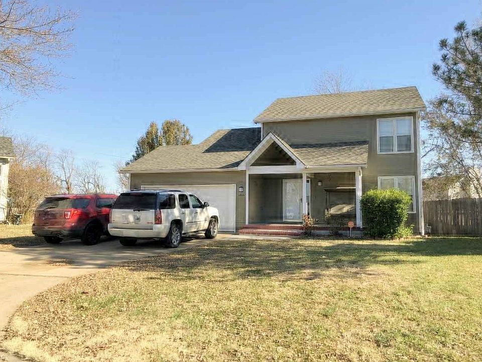 Front of Home with new siding and roof.