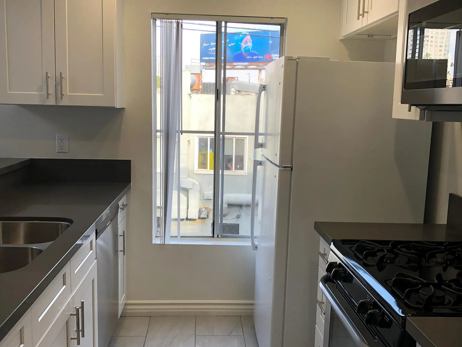10911 Rochester Ave — Photo 4
