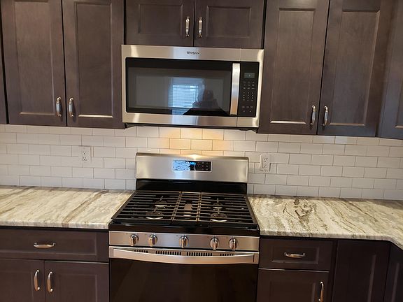 All new includes subway tile backsplash .self cleaning stove