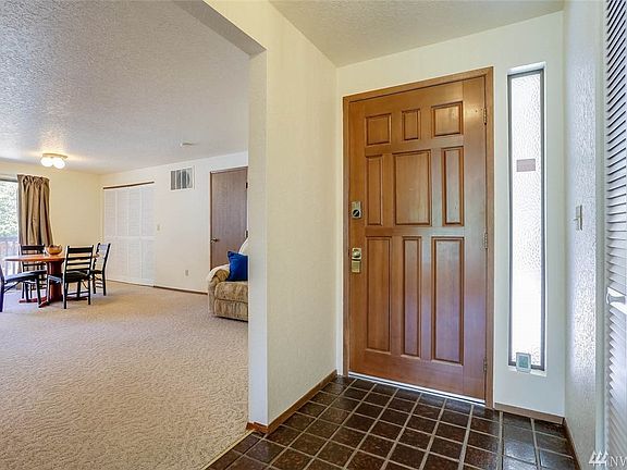 This home features a tile entry and large coat closet. Enjoy open sight-lines from the entry to the family room and living room.