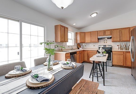 Spacious & open this Farmhouse Country Kitchen with BRAND NEW Amana Stainless appliances is the Command Center of this beautiful home!