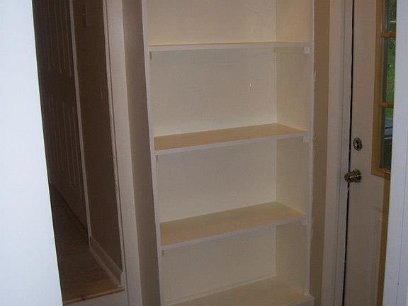 Shelves at side door