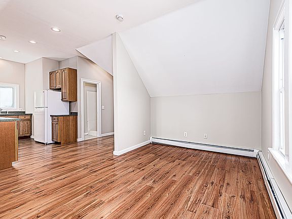 upstairs living room through kitchen view