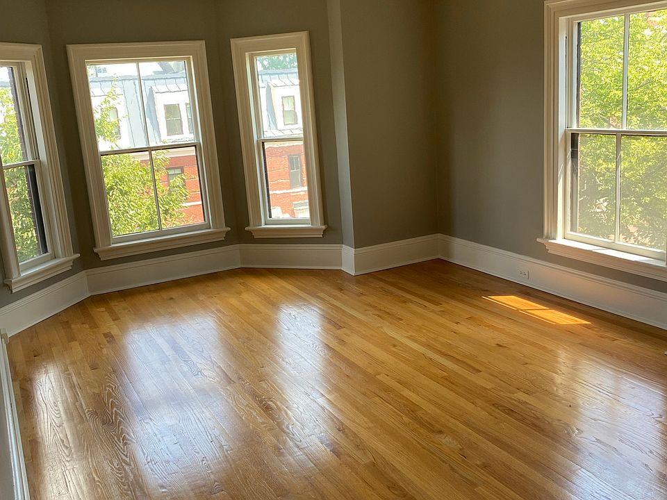 Bright sunny livingroom, Large windows and beautiful wood oak floors.