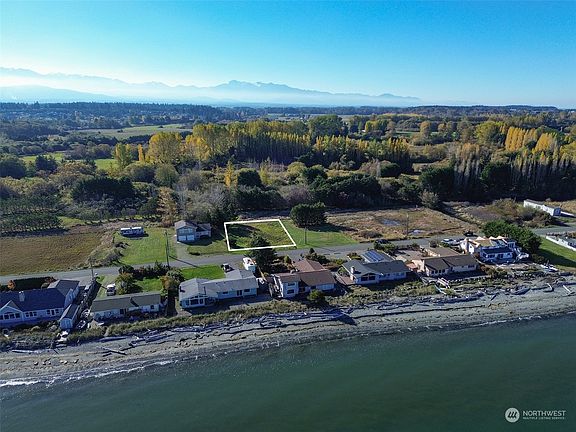 Approximate property lines shown in white.>