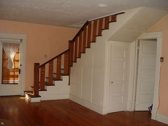 Stairs From Living Room to 2 Bedrooms On 2nd Level