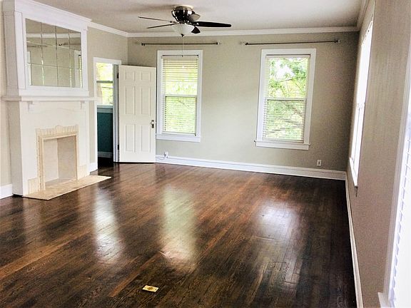 Television is hidden behind the mirror above the fireplace. Note- fireplace is cosmetic only