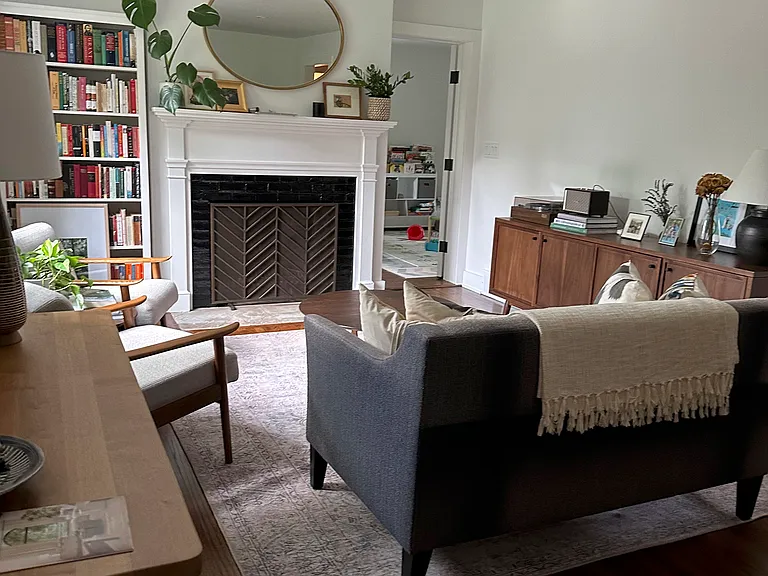 The living room. Warm, lots of great light, spacious.