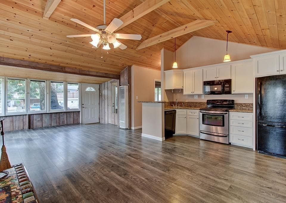 wood floors and rustic beamed ceilings