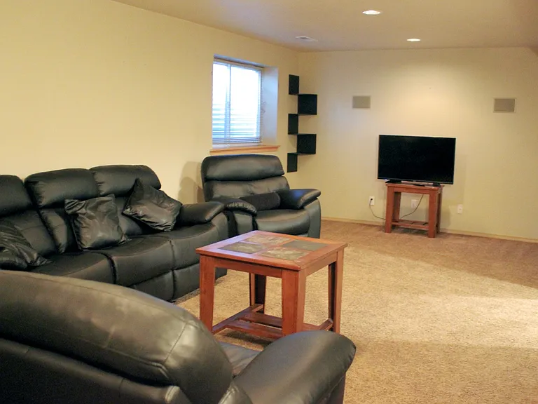Family room in basement with egress window