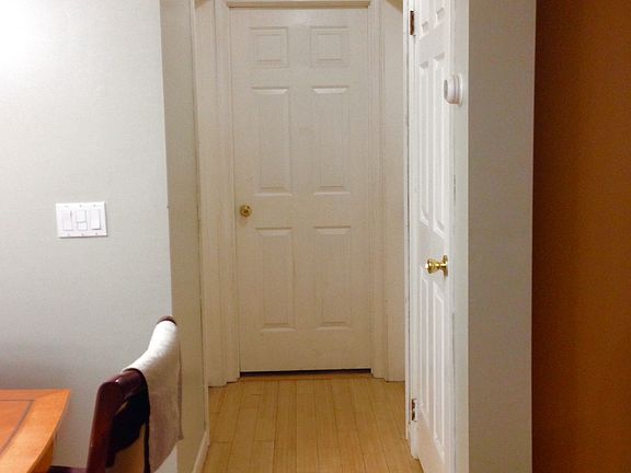 Hallway to 2 bedrooms and bathroom.