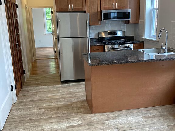 Open concept kitchen into living space