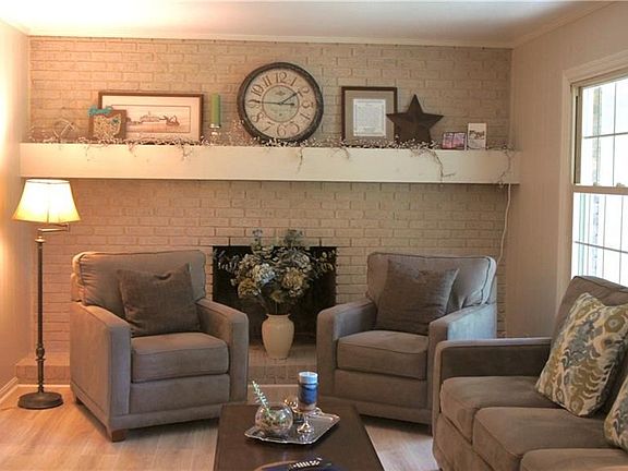 FAMILY ROOM WITH BRICK FIREPLACE