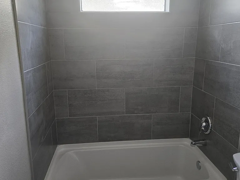 New tile and tub in 2nd bath