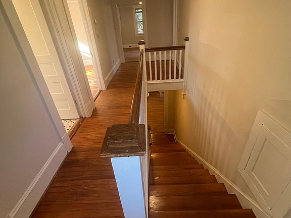 Stairs up to kitchen, bedrooms and large outdoor balcony