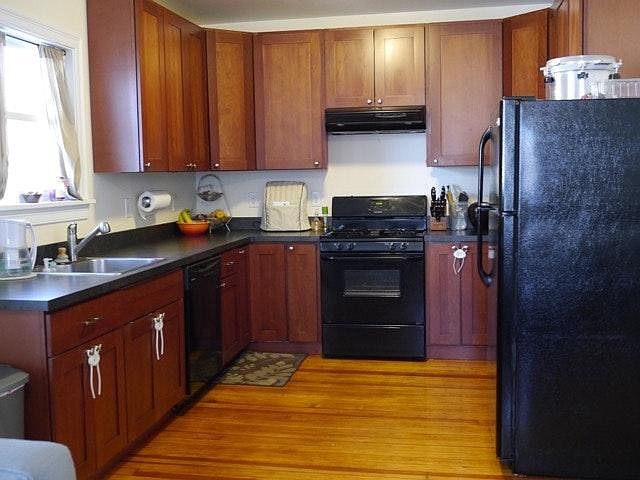 large Kitchen with newer appliances including dishwasher