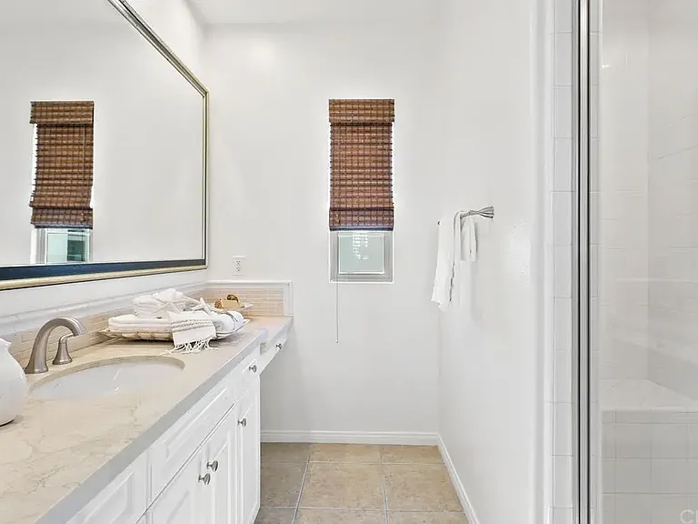 two of two sinks with area for vanity at the end