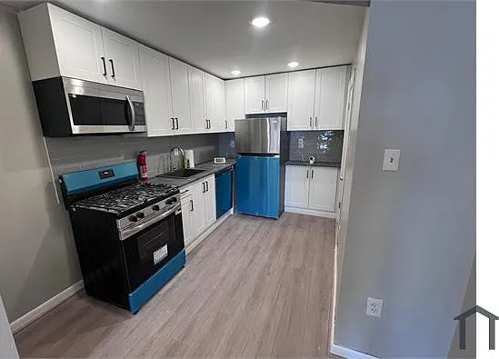 1322 S Newkirk St — Photo 1