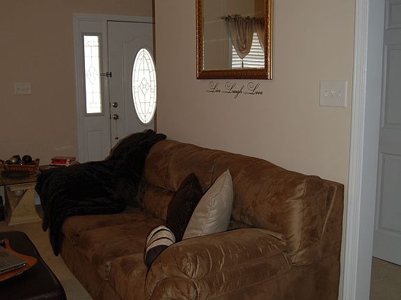 Front Door/Hall/Living Room (viewed from dining room