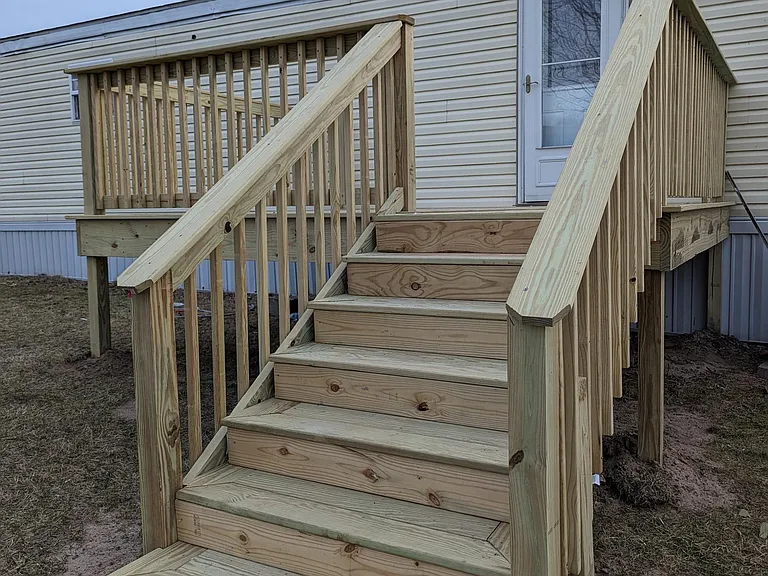 Rear Deck with rear entry with storm door