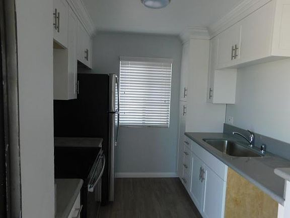 Kitchen with Stainless Steel Appliances & Custom Cabinets