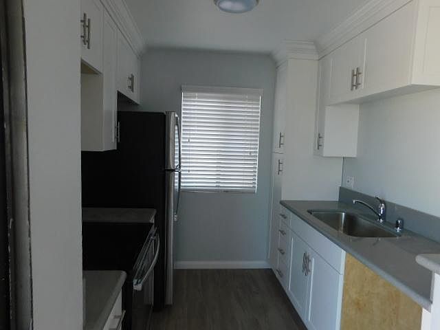 Kitchen with Stainless Steel Appliances & Custom Cabinets