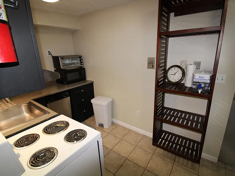 Kitchen wih wall storage shelves